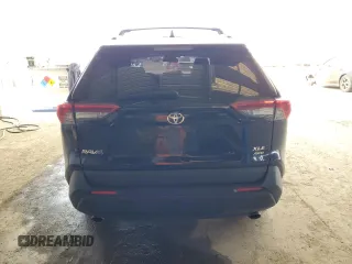 2019 Toyota RAV4 XLE Premium with VIN JTMA1RFV5KD026145, listed as a Copart auction lot 48238125 with 101,443 mi miles and Salvage Title. Bid and sale history available at carsss.com. Image 6.