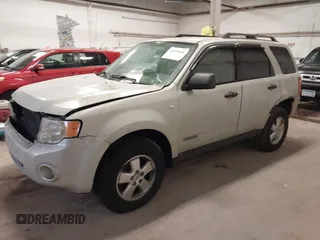 2008 Ford Escape XLT with VIN 1FMCU93128KC67338, listed as a IAAI auction lot 42099606 with 188,817 mi miles. Bid and sale history available at carsss.com. Image 2.