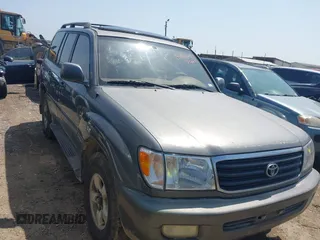 2000 Toyota Land Cruiser with VIN JT3HT05J8Y0107146, listed as a IAAI auction lot 41927945 with 385,504 mi miles. Bid and sale history available at carsss.com. Image 1.