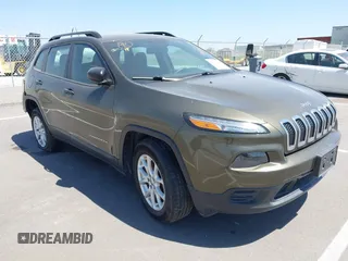 2015 Jeep Cherokee Sport z VIN 1C4PJMAB9FW595102, wystawiony jako IAAI lot #42257918 z przebiegiem 95 059 mil mil oraz . Historia ofert i sprzedaży dostępna na DreamBid. Obrazek 1.