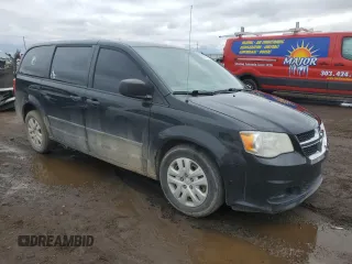 2015 Dodge Grand Caravan SE with VIN 2C4RDGBG7FR516773, listed as a Copart auction lot 52035135 with 132,122 mi miles and Salvage Title. Bid and sale history available at DreamBid. Image 4.
