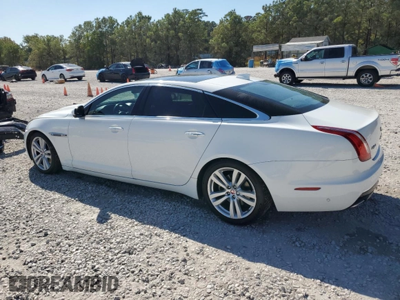 2016 Jaguar XJ Portfolio with VIN SAJWA2G79G8W00955, listed as a Copart auction lot 77650194 with 60,515 mi miles and Clean title. Bid and sale history available at DreamBid. Image 2.