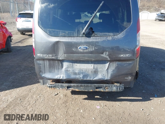 2018 Ford Transit Connect XLT z VIN NM0GE9F79J1360871, wystawiony jako IAAI lot #41832433 z przebiegiem 274 543 mil mil oraz . Historia ofert i sprzedaży dostępna na DreamBid. Obrazek 6.