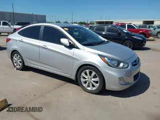 2013 Hyundai Accent GLS z VIN KMHCU4AE7DU295482, wystawiony jako IAAI lot #41944092 z przebiegiem 106 785 mil mil oraz . Historia ofert i sprzedaży dostępna na DreamBid. Obrazek 1.