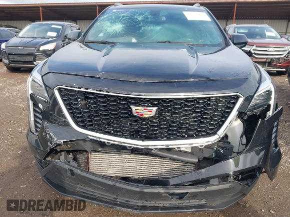 2019 Cadillac XT4 AWD Sport with VIN 1GYFZFR40KF111912, listed as a IAAI auction lot 42375992 with 98,006 mi miles and . Bid and sale history available at DreamBid. Image 6.