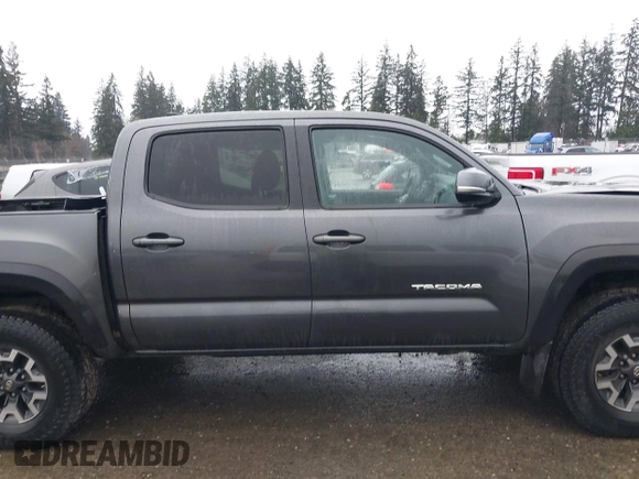 2017 Toyota Tacoma SR5 z VIN 3TMCZ5AN2HM084549, wystawiony jako IAAI lot #41834454 z przebiegiem 143 387 mil mil oraz . Historia ofert i sprzedaży dostępna na DreamBid. Obrazek 14.