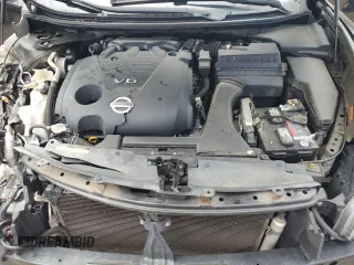 2014 Nissan Maxima SV z VIN 1N4AA5AP9EC454320, wystawiony jako Copart lot #57100695 z przebiegiem 149 083 mil mil oraz Szkoda całkowita • Salvage title. Historia ofert i sprzedaży dostępna na DreamBid. Obrazek 11.
