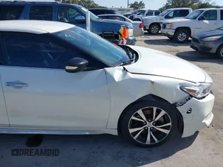 2017 Nissan Maxima SV with VIN 1N4AA6AP7HC456500, listed as a IAAI auction lot 41678956 with 159,995 mi miles and . Bid and sale history available at DreamBid. Image 6.
