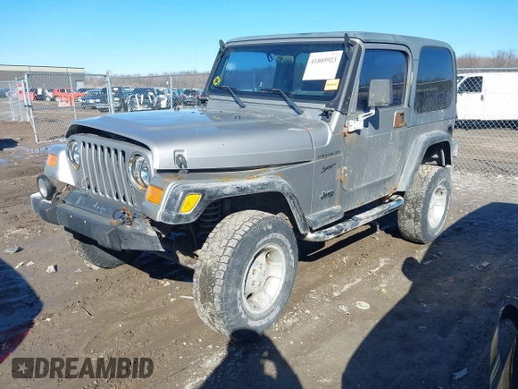 2002 Jeep Wrangler Sport with VIN 1J4FA49SX2P732367, listed as a IAAI auction lot 41805923 with 204,757 mi miles. Bid and sale history available at carsss.com. Image 2.