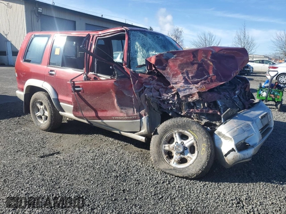 1999 Isuzu Trooper S with VIN JACDJ58X7X7931091, listed as a Copart auction lot 44824285 with Not provided miles and Salvage title. Bid and sale history available at DreamBid. Image 4.