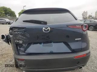 2024 Mazda CX-30 S Preferred z VIN 3MVDMBCM2RM658640, wystawiony jako Copart lot #58672425 z przebiegiem 7 977 mil mil oraz Szkoda całkowita • Salvage title. Historia ofert i sprzedaży dostępna na DreamBid. Obrazek 6.