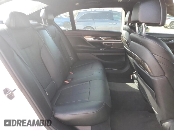 2016 BMW 7 Series 740i with VIN WBA7E2C58GG548314, listed as a Copart auction lot 72876922 with 74,981 mi miles. Bid and sale history available at carsss.com. Image 10.