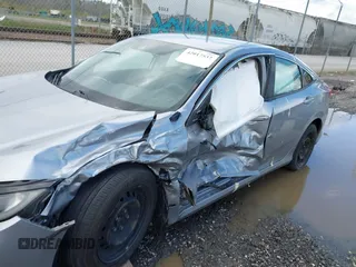 2019 Honda Civic LX with VIN 19XFC2F61KE009471, listed as a IAAI auction lot 42017532 with 81,134 mi miles and . Bid and sale history available at DreamBid. Image 6.