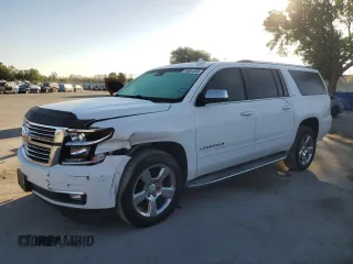 2015 Chevrolet Suburban LTZ with VIN 1GNSCKKC5FR575466, listed as a Copart auction lot 48944535 with 136,542 mi miles and Salvage Title. Bid and sale history available at DreamBid. Image 1.
