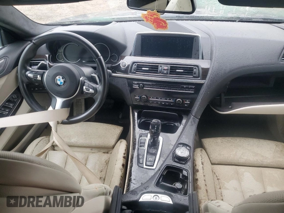 2015 BMW 6 Series 640i with VIN WBA6A0C59FGB53667, listed as a Copart auction lot 74034834 with Not Provided miles and Salvage Title. Bid and sale history available at DreamBid. Image 8.