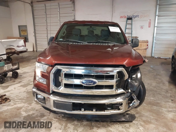2015 Ford F-150 XLT with VIN 1FTEW1C84FKD05672, listed as a IAAI auction lot 41366154 with 119,504 mi miles and . Bid and sale history available at carsss.com. Image 12.