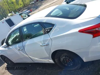 2018 Nissan Sentra S z VIN 3N1AB7AP7JY310031, wystawiony jako IAAI lot #41974445 z przebiegiem 106 842 mil mil oraz . Historia ofert i sprzedaży dostępna na DreamBid. Obrazek 14.