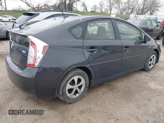 2015 Toyota Prius Four with VIN JTDKN3DU5F0433864, listed as a IAAI auction lot 42106791 with 113,989 mi miles and . Bid and sale history available at DreamBid. Image 4.