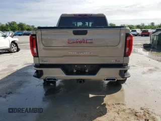 2023 GMC Sierra 1500 AT4 with VIN 1GTUUEE89PZ218574, listed as a Copart auction lot 55883305 with 34,239 mi miles and Salvage title. Bid and sale history available at DreamBid. Image 6.