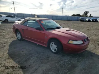 1999 Ford Mustang with VIN 1FAFP4446XF231749, listed as a Copart auction lot 73981604 with Not provided miles and Clean title. Bid and sale history available at DreamBid. Image 4.
