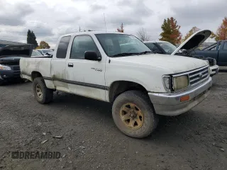 1997 Toyota T100 DX z VIN JT4UN22DXV0041578, wystawiony jako Copart lot #77388104 z przebiegiem 333 587 mil mil oraz Tytuł czysty. Historia ofert i sprzedaży dostępna na DreamBid. Obrazek 4.