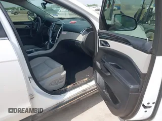2013 Cadillac SRX Performance Collection z VIN 3GYFNDE30DS648288, wystawiony jako IAAI lot #41955462 z przebiegiem 135 956 mil mil oraz . Historia ofert i sprzedaży dostępna na DreamBid. Obrazek 5.