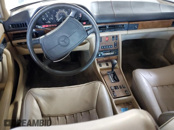 1986 Mercedes-Benz 560 with VIN WDBCA39D7GA259749, listed as a Copart auction lot 70691454 with 186,131 mi miles and Clean Title. Bid and sale history available at DreamBid. Image 8.