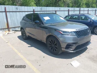 2018 Land Rover Range Rover Velar R-Dynamic SE z VIN SALYL2RV4JA741471, wystawiony jako IAAI lot #42760957 z przebiegiem 66 617 mil mil oraz . Historia ofert i sprzedaży dostępna na DreamBid. Obrazek 1.