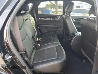 2022 Cadillac XT5 FWD Premium Luxury z VIN 1GYKNCRS7NZ101131, wystawiony jako Copart lot #56365065 z przebiegiem 74 168 mil mil oraz Szkoda całkowita • Salvage title. Historia ofert i sprzedaży dostępna na DreamBid. Obrazek 11.