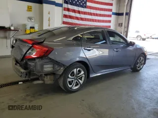 2017 Honda Civic LX with VIN 2HGFC2F5XHH539976, listed as a Copart auction lot 60558865 with 79,519 mi miles and Salvage title. Bid and sale history available at DreamBid. Image 3.