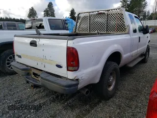 2002 Ford Super Duty F-250 XL with VIN 1FTNX21SX2EB43928, listed as a Copart auction lot 88308645 with 218,584 mi miles and Salvage Title. Bid and sale history available at carsss.com. Image 3.