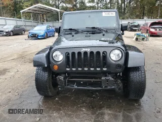2008 Jeep Wrangler Unlimited Sahara with VIN 1J4GA59148L574934, listed as a Copart auction lot 74590164 with 134,674 mi miles and Salvage title. Bid and sale history available at DreamBid. Image 5.