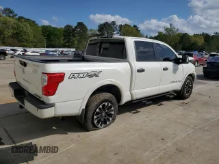 2019 Nissan Titan Pro-4X z VIN 1N6AA1E51KN526104, wystawiony jako Copart lot #51694335 z przebiegiem 56 620 mil mil oraz Szkoda całkowita • Salvage title. Historia ofert i sprzedaży dostępna na DreamBid. Obrazek 3.