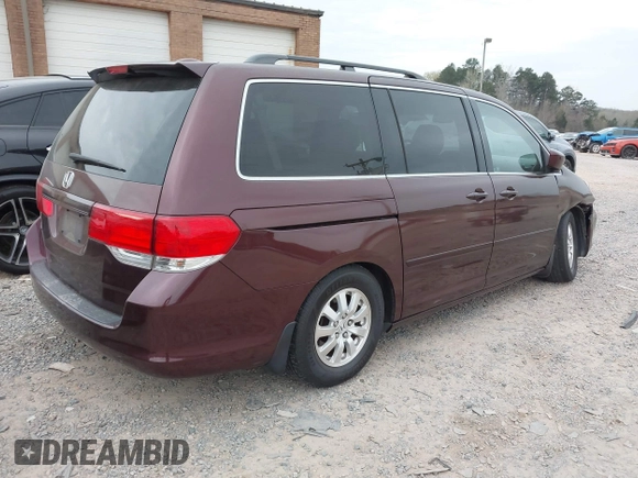 2010 Honda Odyssey EX-L with VIN 5FNRL3H77AB017916, listed as a IAAI auction lot 41855368 with 204,567 mi miles. Bid and sale history available at carsss.com. Image 4.