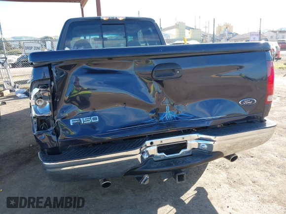 1999 Ford F-150 XL with VIN 1FTRX17L4XKA58054, listed as a IAAI auction lot 41647530 with 225,632 mi miles. Bid and sale history available at carsss.com. Image 6.