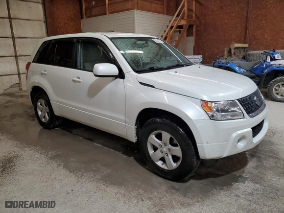 2012 Suzuki Grand Vitara Premium with VIN JS3TD0D66C4100845, listed as a Copart auction lot 53454565 with 106,415 mi miles and Salvage Title. Bid and sale history available at carsss.com. Image 4.