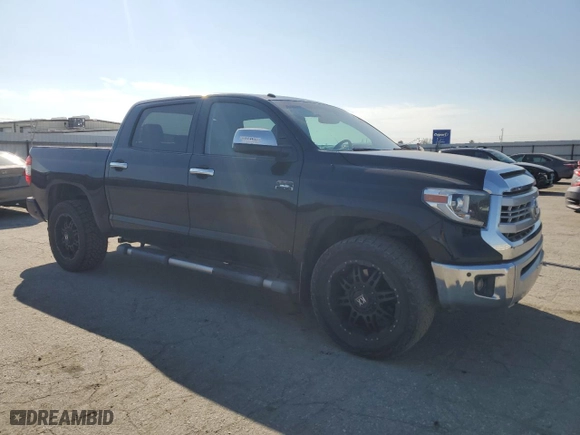 2014 Toyota Tundra 4WD Truck Platinum with VIN 5TFAY5F12EX404586, listed as a Copart auction lot 50430165 with 160,045 mi miles and Salvage Title. Bid and sale history available at carsss.com. Image 4.