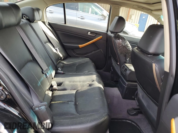 2004 Infiniti G35 w/Leather z VIN JNKCV51F34M708688, wystawiony jako Copart lot #59127945 z przebiegiem 199 727 mil mil oraz Szkoda całkowita • Salvage title. Historia ofert i sprzedaży dostępna na DreamBid. Obrazek 10.