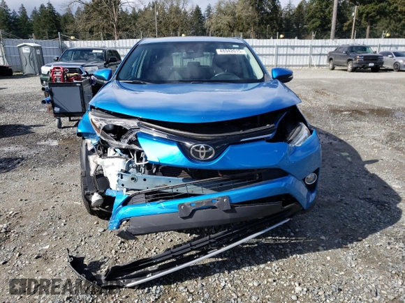 2018 Toyota RAV4 XLE with VIN 2T3RFREV3JW752934, listed as a Copart auction lot 48942015 with 74,182 mi miles and Salvage Title. Bid and sale history available at DreamBid. Image 5.