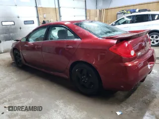 2009 Pontiac G6 GXP 1SA with VIN 1G2ZM577394178197, listed as a Copart auction lot 77670094 with 188,493 mi miles and Clean title. Bid and sale history available at DreamBid. Image 2.
