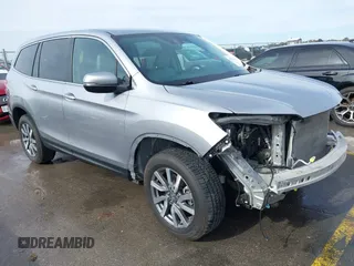 2020 Honda Pilot EX z VIN 5FNYF6H37LB056638, wystawiony jako IAAI lot #41277619 z przebiegiem 62 213 mil mil oraz . Historia ofert i sprzedaży dostępna na DreamBid. Obrazek 1.