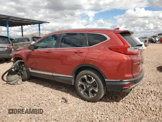 2018 Honda CR-V Touring with VIN 2HKRW2H9XJH670518, listed as a Copart auction lot 48620765 with 61,016 mi miles and Salvage Title. Bid and sale history available at carsss.com. Image 2.