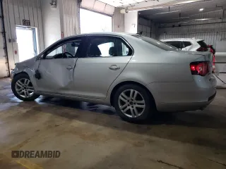 2009 Volkswagen Jetta z VIN 3VWAL71KX9M072304, wystawiony jako Copart lot #57027785 z przebiegiem 191 554 mil mil oraz Szkoda całkowita • Salvage title. Historia ofert i sprzedaży dostępna na DreamBid. Obrazek 2.