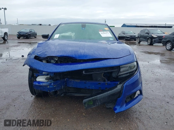 2019 Dodge Charger SXT with VIN 2C3CDXBGXKH748729, listed as a IAAI auction lot 41906272 with 76,816 mi miles. Bid and sale history available at carsss.com. Image 12.
