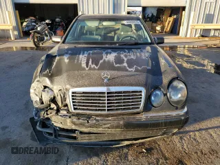 1999 Mercedes-Benz E-Class with VIN WDBJF82H9XX026911, listed as a Copart auction lot 48808835 with 205,953 mi miles and Salvage Title. Bid and sale history available at carsss.com. Image 5.