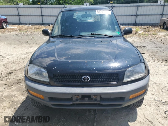 1997 Toyota RAV4 with VIN JT3HP10V3V7059398, listed as a Copart auction lot 54709995 with 186,467 mi miles and Salvage title. Bid and sale history available at DreamBid. Image 5.