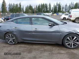 2023 Nissan Maxima SV with VIN 1N4AA6CV4PC512497, listed as a IAAI auction lot 41760990 with 32,400 mi miles and . Bid and sale history available at DreamBid. Image 13.
