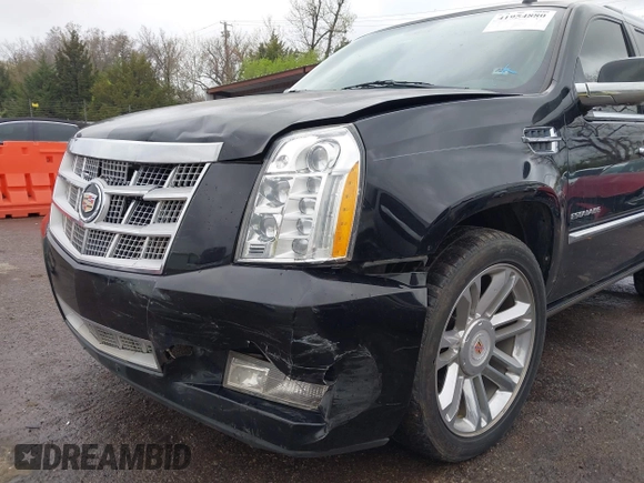 2014 Cadillac Escalade Platinum z VIN 1GYS4DEF9ER212880, wystawiony jako IAAI lot #41954880 z przebiegiem 193 203 mil mil oraz . Historia ofert i sprzedaży dostępna na DreamBid. Obrazek 6.