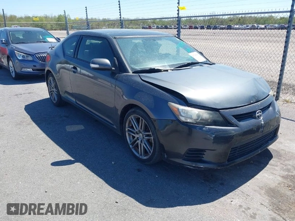 2013 Scion tC with VIN JTKJF5C73D3061994, listed as a IAAI auction lot 41785859 with 133,610 mi miles. Bid and sale history available at carsss.com. Image 1.