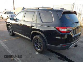 2023 Honda Pilot TrailSport with VIN 5FNYG1H60PB023366, listed as a IAAI auction lot 41040848 with 16,051 mi miles. Bid and sale history available at carsss.com. Image 3.